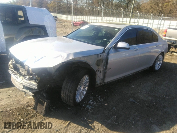 2012 BMW 7 Series 750Li with VIN WBAKB8C56CC962425, listed as a IAAI auction lot 32792385 with 114,092 mi miles and . Bid and sale history available at DreamBid. Image 2.