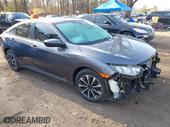 2017 Honda Civic Sedan LX with VIN 19XFC2F56HE233741, listed as a IAAI auction lot 42022068 with 65,587 mi miles. Bid and sale history available at carsss.com. Image 1.