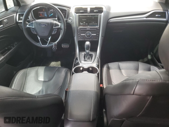 2016 Ford Fusion Titanium z VIN 3FA6P0D94GR181179, wystawiony jako Copart lot #56987005 z przebiegiem 79 841 mil mil oraz Czysty tytuł • Clean title. Historia ofert i sprzedaży dostępna na DreamBid. Obrazek 8.