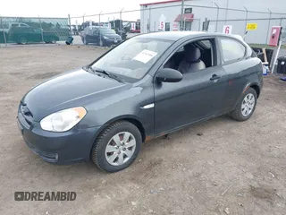 2008 Hyundai Accent GS with VIN KMHCM36C18U091400, listed as a IAAI auction lot 41942989 with 179,072 mi miles. Bid and sale history available at carsss.com. Image 2.
