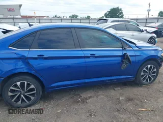 2023 Volkswagen Jetta S with VIN 3VW4M7BU0PM010739, listed as a IAAI auction lot 42400838 with 51,666 mi miles and . Bid and sale history available at DreamBid. Image 14.