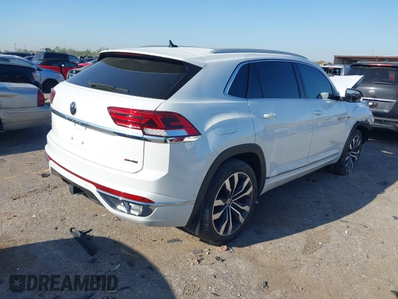 2022 Volkswagen Atlas SEL Premium R-Line with VIN 1V2FE2CA6NC220596, listed as a IAAI auction lot 41864407 with 13,120 mi miles and . Bid and sale history available at DreamBid. Image 4.