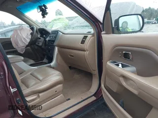 2007 Honda Pilot EX-L with VIN 2HKYF18557H535426, listed as a IAAI auction lot 41126160 with 169,336 mi miles. Bid and sale history available at carsss.com. Image 5.
