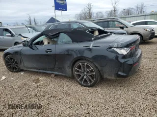 2023 BMW 4 Series 430i xDrive with VIN WBA43AT08PCM90476, listed as a Copart auction lot 50727785 with 11,677 mi miles and Salvage Title. Bid and sale history available at DreamBid. Image 2.