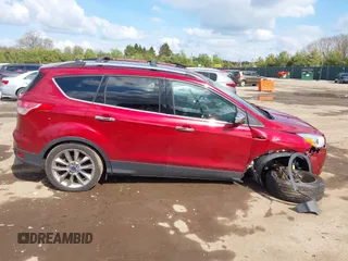2016 Ford Escape SE z VIN 1FMCU9G91GUA83186, wystawiony jako IAAI lot #42190519 z przebiegiem 103 583 mil mil oraz . Historia ofert i sprzedaży dostępna na DreamBid. Obrazek 13.