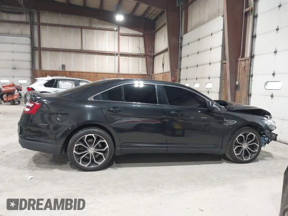 2015 Ford Taurus SHO with VIN 1FAHP2KT0FG132988, listed as a IAAI auction lot 42042314 with 192,974 mi miles and . Bid and sale history available at DreamBid. Image 14.