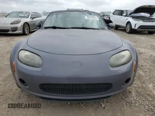 2007 Mazda MX-5 Miata Sport z VIN JM1NC25F970134960, wystawiony jako Copart lot #48422265 z przebiegiem 149 357 mil mil oraz Czysty tytuł • Clean title. Historia ofert i sprzedaży dostępna na DreamBid. Obrazek 5.
