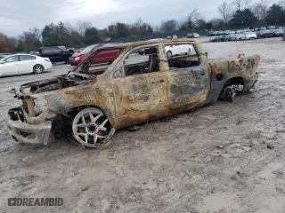 2021 Ram 1500 Laramie with VIN 1C6SRFJT6MN704889, listed as a Copart auction lot 84182964 with 0 mi miles and Non Repairable. Bid and sale history available at carsss.com. Image 1.