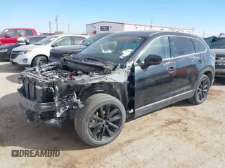 2023 Mazda CX-9 Touring Plus with VIN JM3TCBAY9P0649348, listed as a IAAI auction lot 41519499 with 23,749 mi miles and . Bid and sale history available at DreamBid. Image 2.