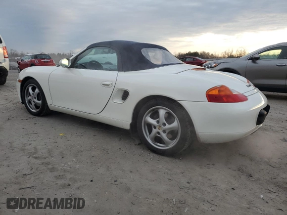 2000 Porsche Boxster z VIN WP0CA2980YU622861, wystawiony jako Copart lot #78993794 z przebiegiem 129 631 mil mil oraz Czysty tytuł • Clean title. Historia ofert i sprzedaży dostępna na DreamBid. Obrazek 2.