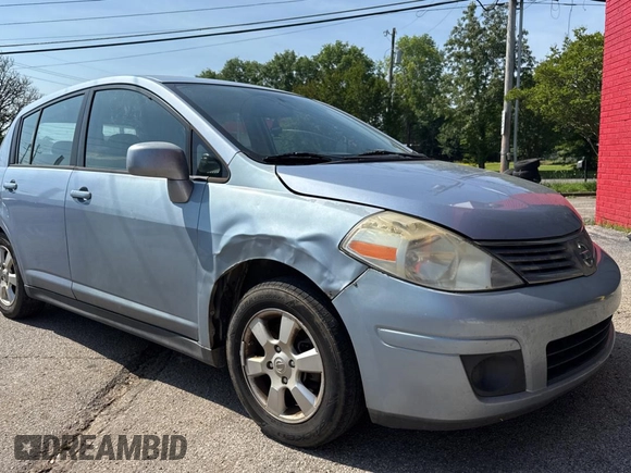 2009 Nissan Versa S with VIN 3N1BC13E99L412868, listed as a Copart auction lot 55990665 with 214,080 mi miles and Clean Title. Bid and sale history available at DreamBid. Image 1.