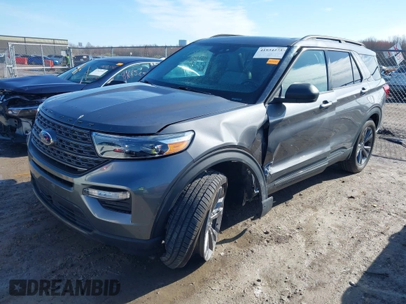 2021 Ford Explorer XLT with VIN 1FMSK8DH1MGA14273, listed as a IAAI auction lot 41934273 with 59,468 mi miles. Bid and sale history available at carsss.com. Image 2.
