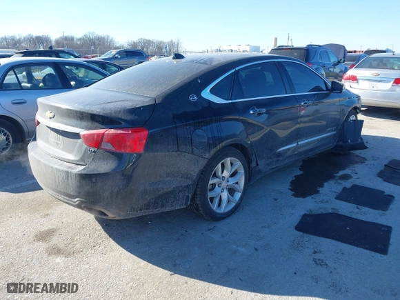 2014 Chevrolet Impala LTZ with VIN 2G1155S31E9105694, listed as a IAAI auction lot 41414595 with 128,828 mi miles. Bid and sale history available at carsss.com. Image 4.