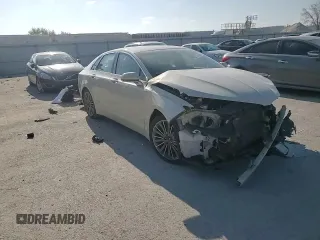 2016 Lincoln MKZ z VIN 3LN6L2G99GR610812, wystawiony jako Copart lot #52916045 z przebiegiem 181 235 mil mil oraz Szkoda całkowita • Salvage title. Historia ofert i sprzedaży dostępna na DreamBid. Obrazek 10.