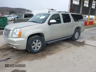 2014 GMC Yukon XL SLT with VIN 1GKS2KE71ER223496, listed as a IAAI auction lot 41419800 with 146,686 mi miles. Bid and sale history available at carsss.com. Image 2.