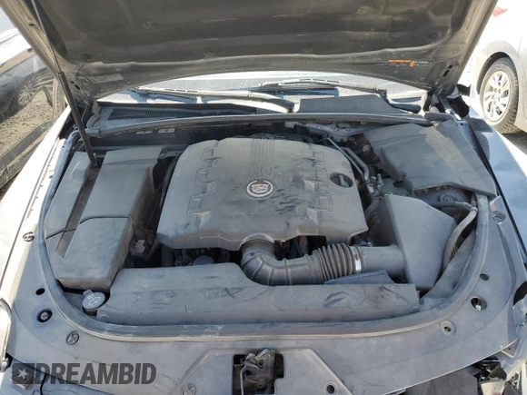 2012 Cadillac CTS Premium z VIN 1G6DS5E35C0128558, wystawiony jako Copart lot #65431155 z przebiegiem 186 593 mil mil oraz Szkoda całkowita • Salvage title. Historia ofert i sprzedaży dostępna na DreamBid. Obrazek 11.