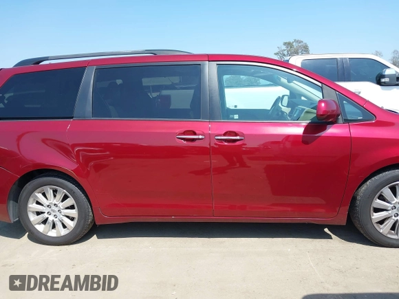 2012 Toyota Sienna XLE AAS with VIN 5TDYK3DC4CS193516, listed as a IAAI auction lot 42188284 with 239,034 mi miles. Bid and sale history available at carsss.com. Image 13.