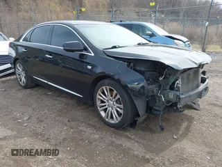 2018 Cadillac XTS Luxury with VIN 2G61M5S30J9145353, listed as a IAAI auction lot 41859404 with 137,874 mi miles. Bid and sale history available at carsss.com. Image 1.