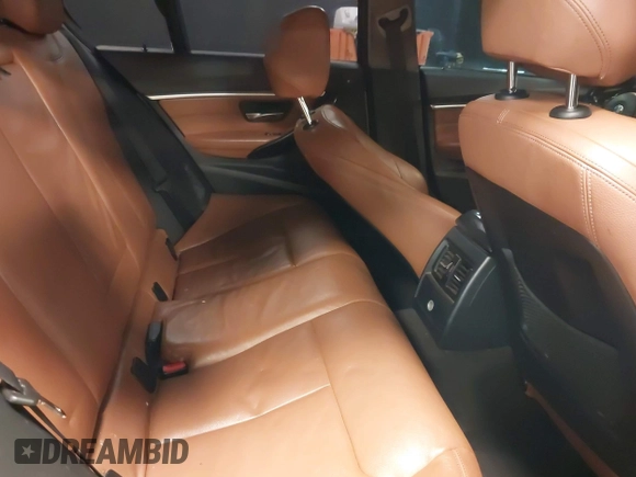 2013 BMW 3 Series 335i xDrive with VIN WBA3B9C54DF586575, listed as a IAAI auction lot 42285797 with 204,461 mi miles and . Bid and sale history available at DreamBid. Image 8.