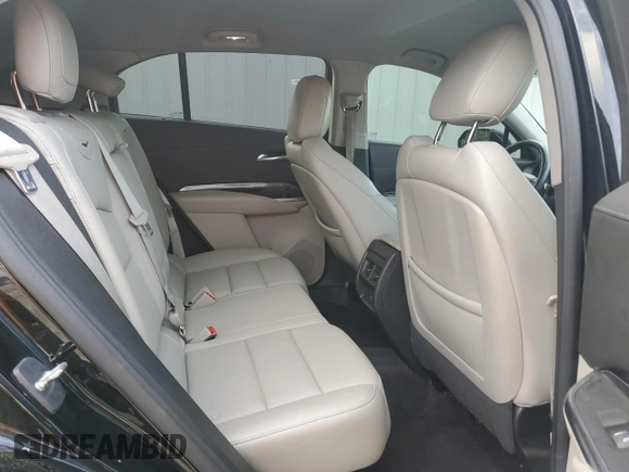 2020 Cadillac XT4 FWD Luxury with VIN 1GYAZAR47LF142704, listed as a Copart auction lot 86730714 with 122,356 mi miles and Salvage Title. Bid and sale history available at DreamBid. Image 10.