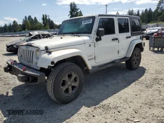 2014 Jeep Wrangler Unlimited Sahara z VIN 1C4BJWEG8EL188271, wystawiony jako Copart lot #59972535 z przebiegiem 130 314 mil mil oraz Szkoda całkowita • Salvage title. Historia ofert i sprzedaży dostępna na DreamBid. Obrazek 1.