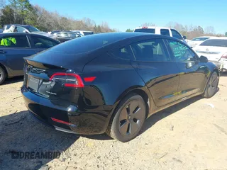 2023 Tesla Model 3 Long Range with VIN 5YJ3E1EB6PF634116, listed as a IAAI auction lot 41814670 with 47,801 mi miles and . Bid and sale history available at DreamBid. Image 4.