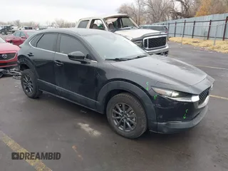 2020 Mazda CX-30 with VIN 3MVDMABLXLM113036, listed as a IAAI auction lot 41173272 with 65,570 mi miles. Bid and sale history available at carsss.com. Image 1.