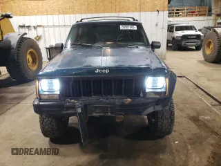 1996 Jeep Cherokee Sport with VIN 1J4FJ68S1TL226495, listed as a Copart auction lot 58587685 with 205,397 mi miles and Salvage title. Bid and sale history available at DreamBid. Image 5.