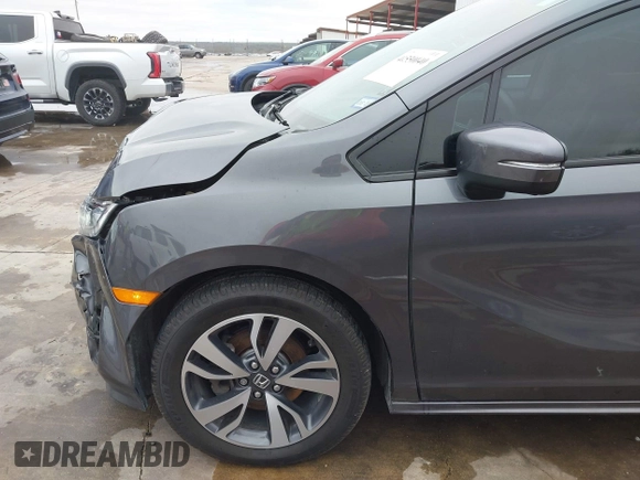 2021 Honda Odyssey Touring with VIN 5FNRL6H86MB021504, listed as a IAAI auction lot 41550040 with 55,068 mi miles. Bid and sale history available at carsss.com. Image 19.
