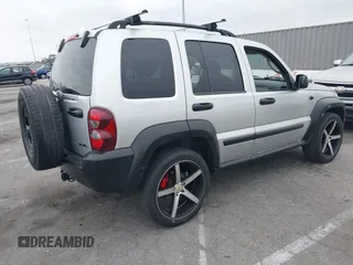 2007 Jeep Liberty Sport with VIN 1J4GK48K67W511199, listed as a IAAI auction lot 42079058 with 156,699 mi miles. Bid and sale history available at carsss.com. Image 4.