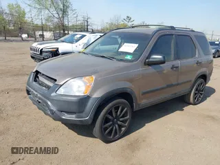 2003 Honda CR-V EX with VIN SHSRD78853U147671, listed as a IAAI auction lot 42117265 with 228,072 mi miles and . Bid and sale history available at carsss.com. Image 2.