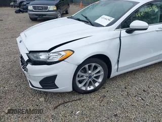 2020 Ford Fusion SE with VIN 3FA6P0LU5LR151074, listed as a IAAI auction lot 42146290 with 98,574 mi miles and . Bid and sale history available at carsss.com. Image 18.