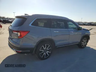 2022 Honda Pilot Elite z VIN 5FNYF6H0XNB060420, wystawiony jako Copart lot #50035415 z przebiegiem 37 288 mil mil oraz Szkoda całkowita • Salvage title. Historia ofert i sprzedaży dostępna na DreamBid. Obrazek 3.