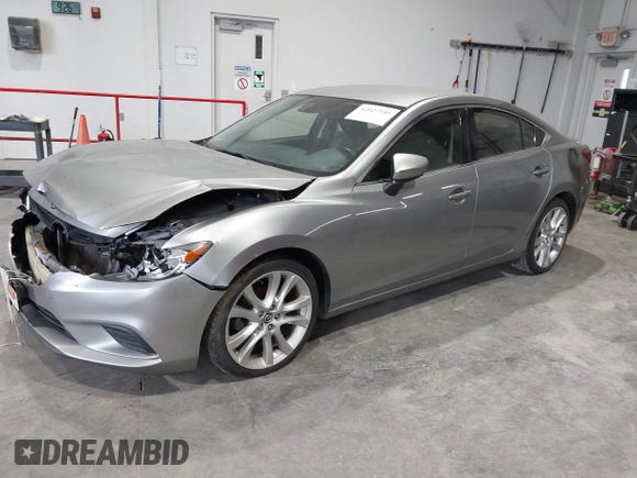 2014 Mazda 6 i Touring with VIN JM1GJ1T51E1106970, listed as a IAAI auction lot 42027350 with 113,756 mi miles and . Bid and sale history available at DreamBid. Image 17.