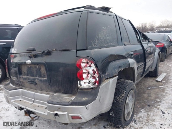 2005 Chevrolet TrailBlazer LT with VIN 1GNDT13S552213766, listed as a IAAI auction lot 41351570 with 114,984 mi miles. Bid and sale history available at carsss.com. Image 4.