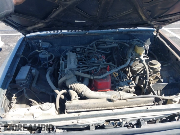 1992 Toyota Pickup DX with VIN JT4RN81P3N5138807, listed as a IAAI auction lot 41823804 with 136,154 mi miles and . Bid and sale history available at DreamBid. Image 10.