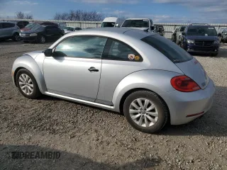 2014 Volkswagen Beetle Entry z VIN 3VWF17AT4EM634714, wystawiony jako Copart lot #83250604 z przebiegiem 133 862 mil mil oraz Szkoda całkowita • Salvage title. Historia ofert i sprzedaży dostępna na DreamBid. Obrazek 2.