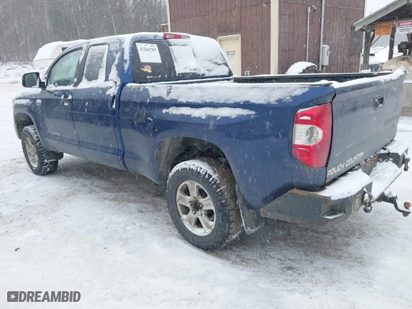 2014 Toyota Tundra 4WD Truck SR with VIN 5TFUY5F18EX392859, listed as a IAAI auction lot 41264709 with 186,881 mi miles. Bid and sale history available at carsss.com. Image 3.