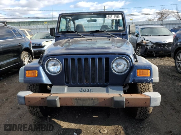 2000 Jeep Wrangler Sport with VIN 1J4FA49S2YP803165, listed as a Copart auction lot 85611904 with 192,427 mi miles and Non repairable. Bid and sale history available at DreamBid. Image 5.