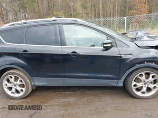2016 Ford Escape Titanium with VIN 1FMCU9J91GUA59639, listed as a IAAI auction lot 41058369 with 138,046 mi miles. Bid and sale history available at carsss.com. Image 14.