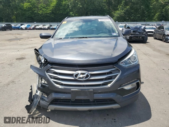 2017 Hyundai Santa Fe 2.4L z VIN 5XYZUDLB8HG430221, wystawiony jako Copart lot #64330015 z przebiegiem 151 318 mil mil oraz Szkoda całkowita • Salvage title. Historia ofert i sprzedaży dostępna na DreamBid. Obrazek 5.