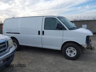 2012 GMC Savana Cargo with VIN 1GTW7FCAXC1180311, listed as a IAAI auction lot 41202714 with 469,562 mi miles. Bid and sale history available at carsss.com. Image 14.