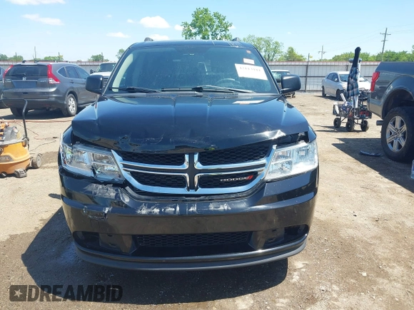 2017 Dodge Journey SE with VIN 3C4PDCAB9HT562563, listed as a IAAI auction lot 42113181 with 86,136 mi miles and . Bid and sale history available at DreamBid. Image 13.