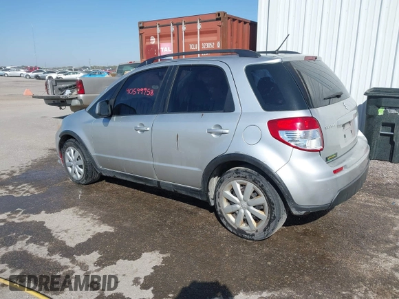 2010 Suzuki SX4 with VIN JS2YA5A30A6301412, listed as a IAAI auction lot 40599958 with 123,177 mi miles. Bid and sale history available at carsss.com. Image 3.