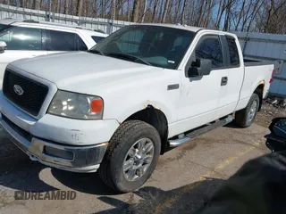 2005 Ford F-150 XLT with VIN 1FTPX14565FA16133, listed as a IAAI auction lot 41782812 with 191,448 mi miles. Bid and sale history available at carsss.com. Image 2.