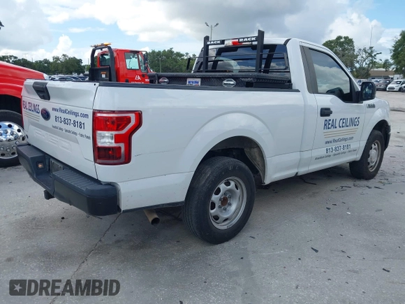 2018 Ford F-150 XL with VIN 1FTMF1CB0JFE21234, listed as a IAAI auction lot 42605399 with 243,035 mi miles and . Bid and sale history available at DreamBid. Image 4.