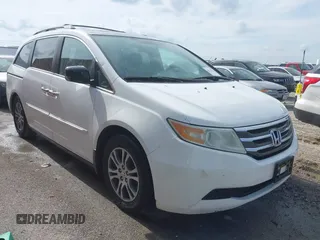 2011 Honda Odyssey EX-L with VIN 5FNRL5H60BB026171, listed as a IAAI auction lot 42511296 with 288,827 mi miles and . Bid and sale history available at DreamBid. Image 1.