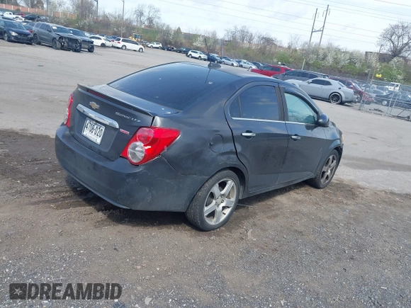 2016 Chevrolet Sonic LTZ z VIN 1G1JE5SB4G4150545, wystawiony jako IAAI lot #41914830 z przebiegiem 166 650 mil mil oraz . Historia ofert i sprzedaży dostępna na DreamBid. Obrazek 4.