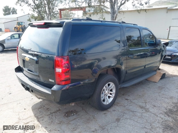 2012 Chevrolet Suburban LT with VIN 1GNSCJE0XCR257186, listed as a IAAI auction lot 41597580 with 174,284 mi miles. Bid and sale history available at carsss.com. Image 4.