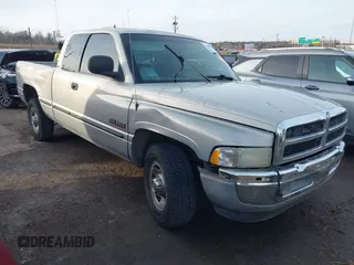 1999 Dodge Ram 2500 with VIN 3B7KC2363XG124121, listed as a IAAI auction lot 41404032 with 250,307 mi miles. Bid and sale history available at carsss.com. Image 1.